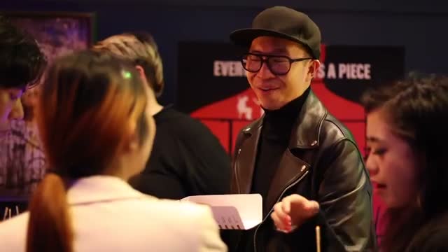 A guest greeting attendees at the Bargain premiere