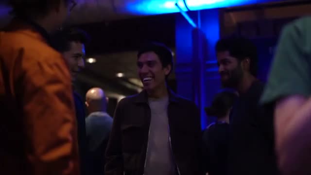 Guests talking inside the Bargain premiere venue