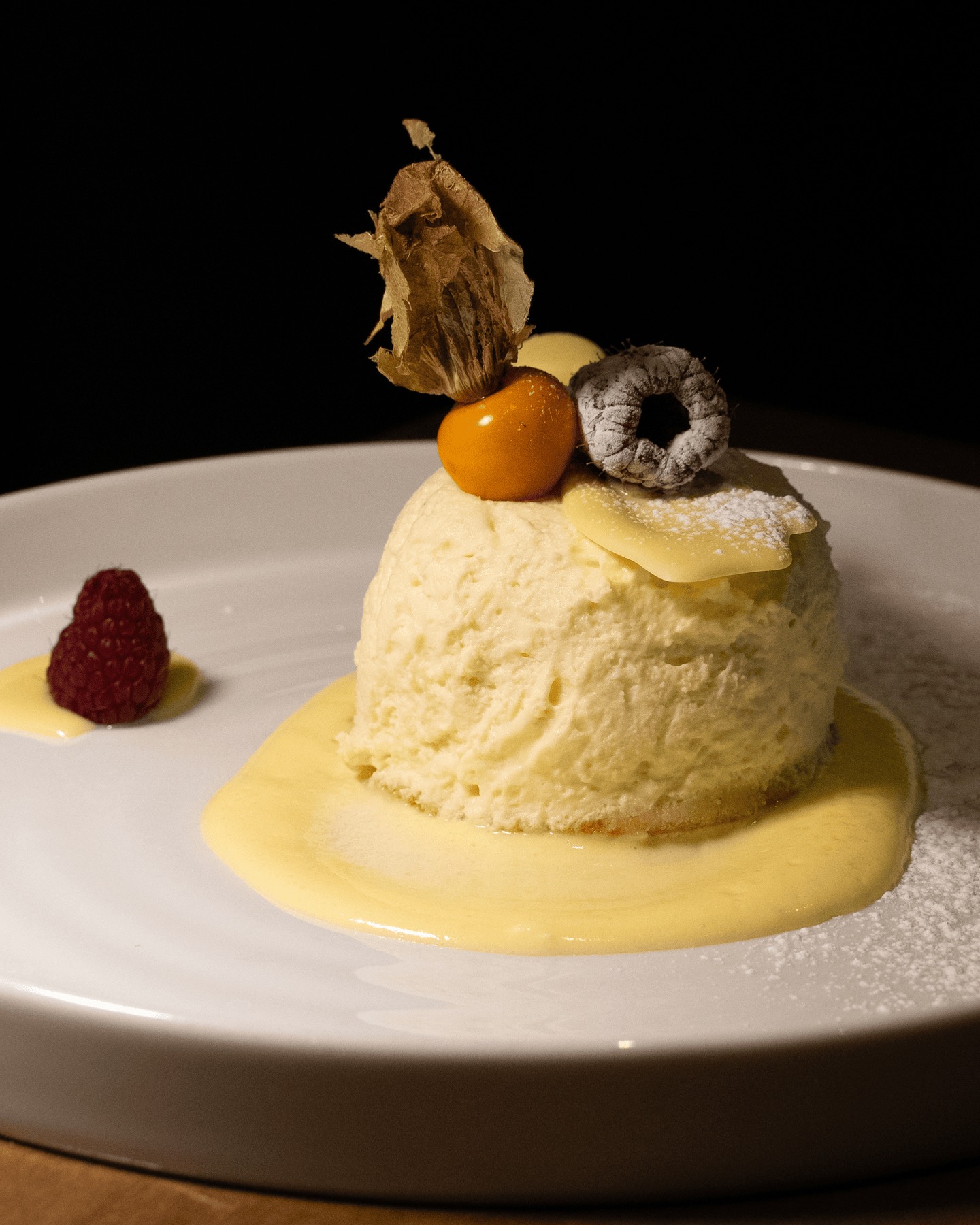 A vanilla semifreddo set clean and light, served with crème anglaise and finished with blackberry and physalis. Simple in composition, class